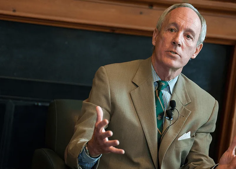 Former UVM President Sullivan in his office on campus