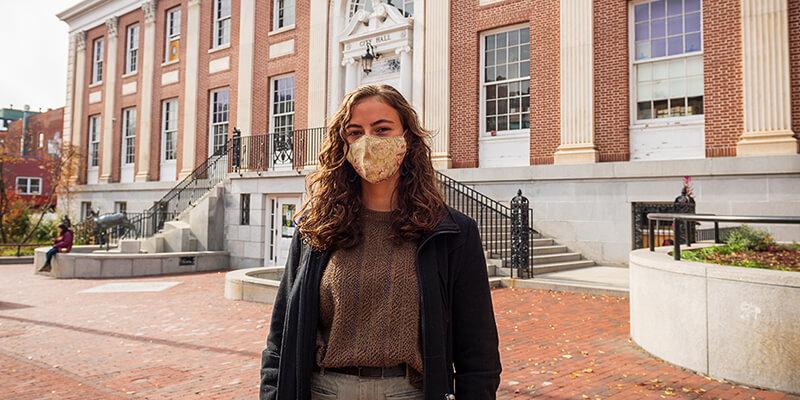 UVM senior Valentina Czochanski in front of Burlington City Hall