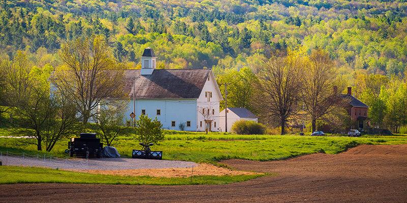 farmhouse, fall trees, ploughed field
