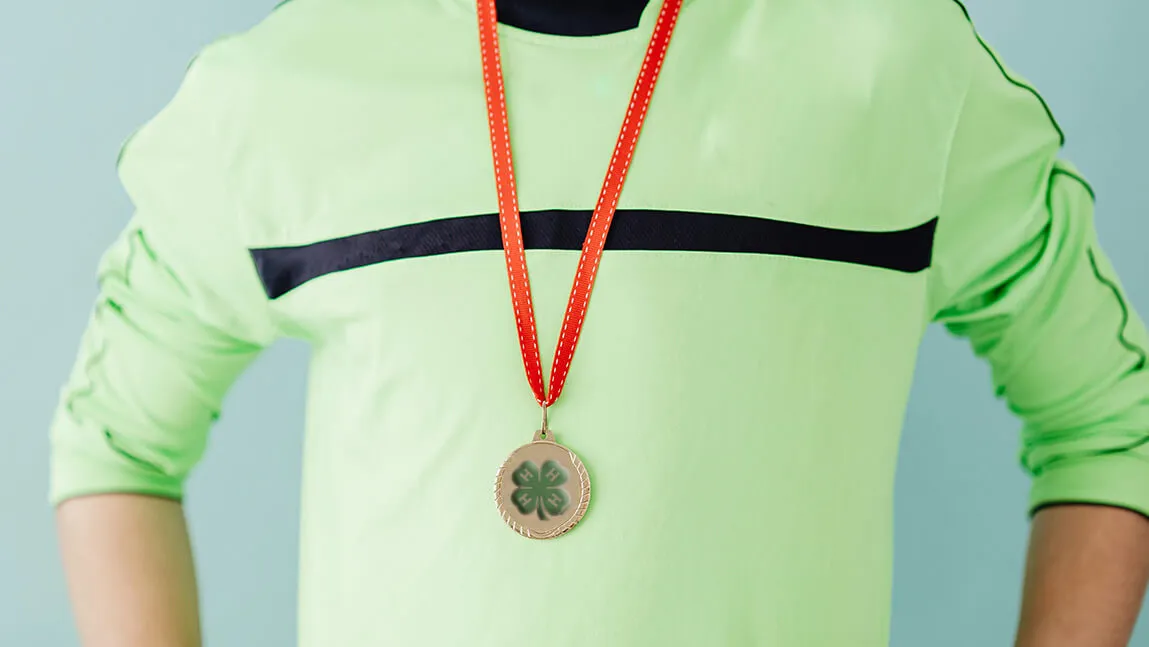 kid wearing a medal