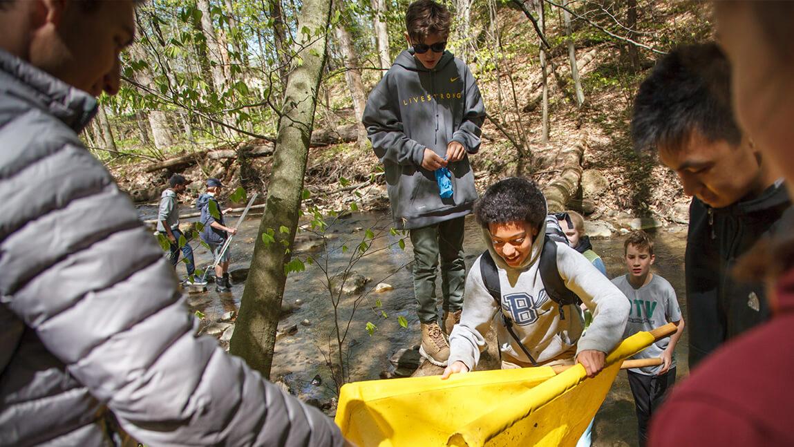 4-H kids in the woods