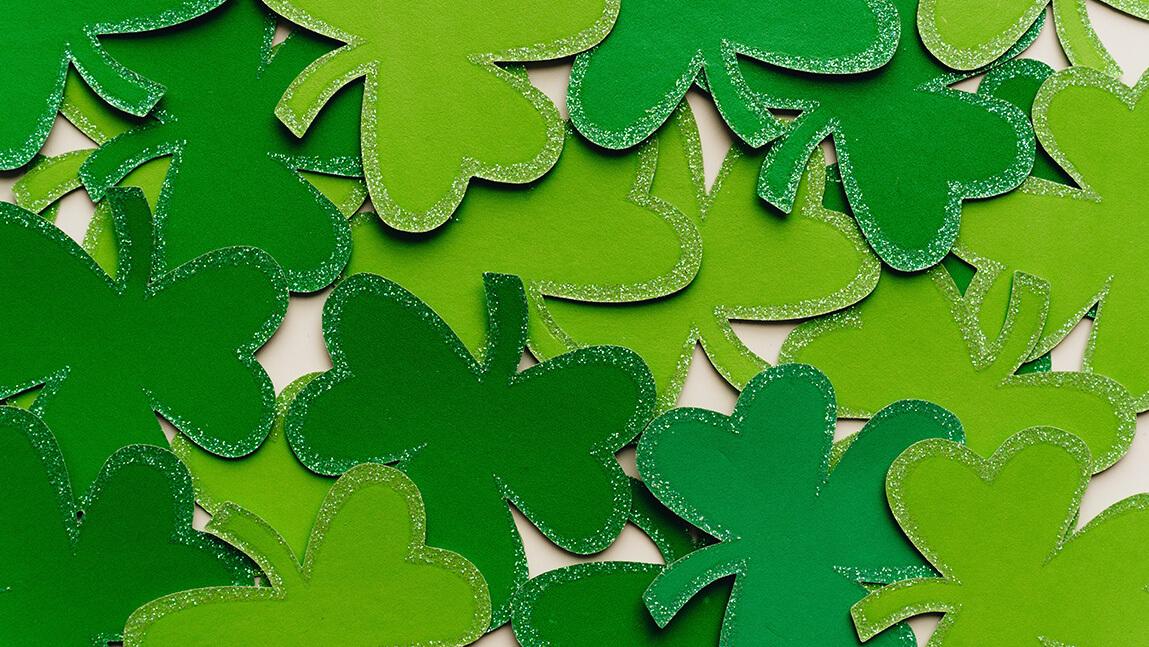 paper cutouts of clovers