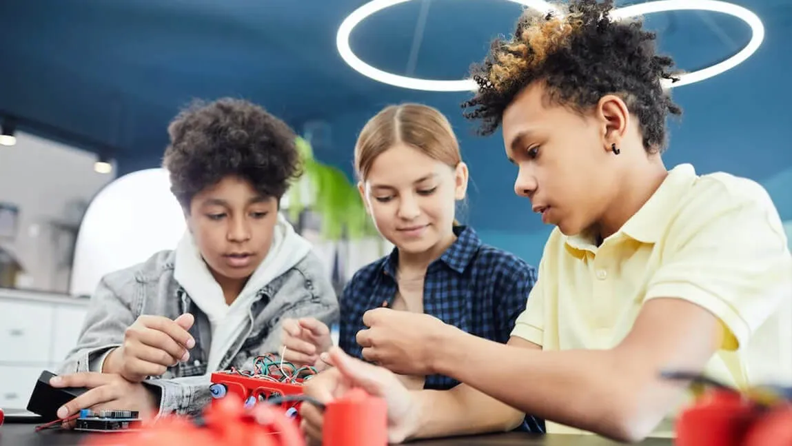 students working on electronics