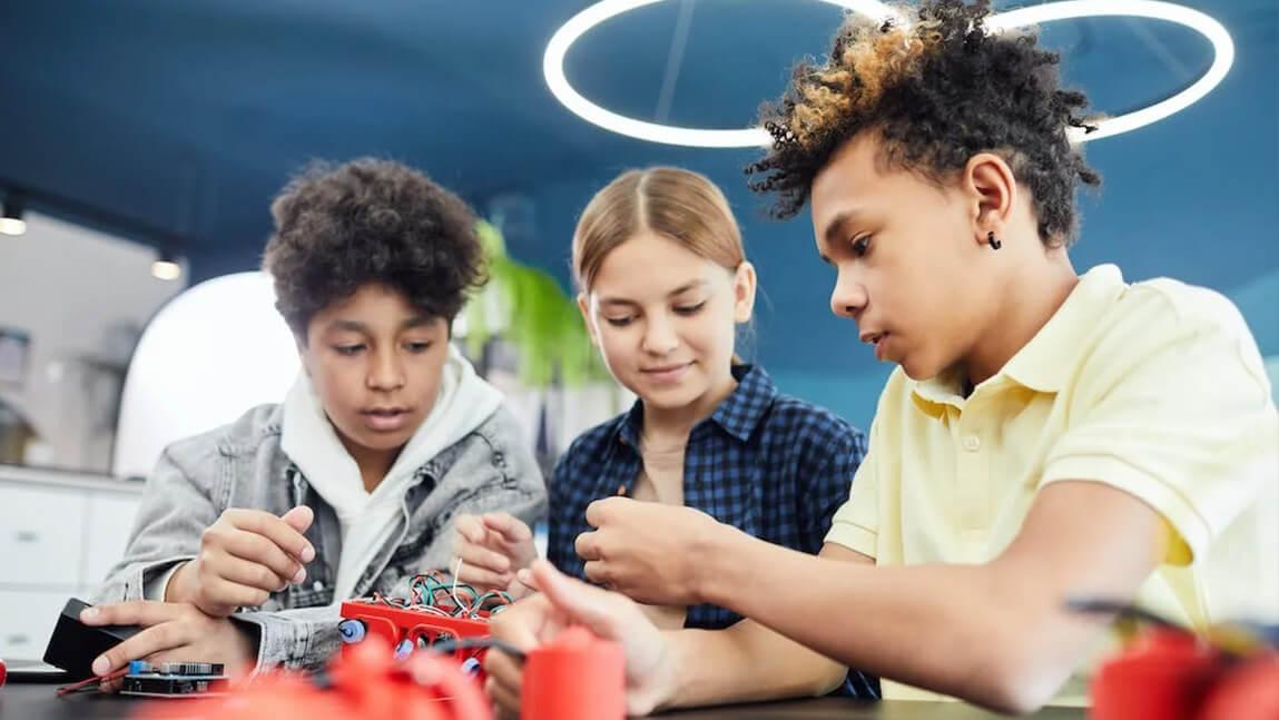 students working on electronics