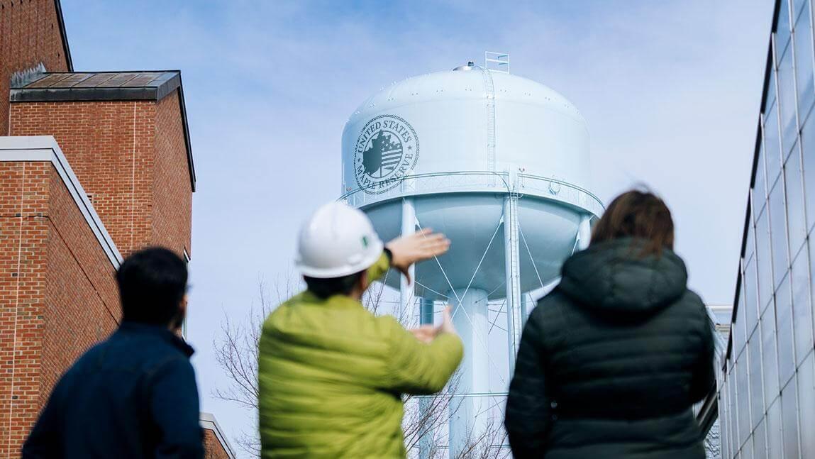 The UVM water tower with a seal reading "United States Maple Reserve"