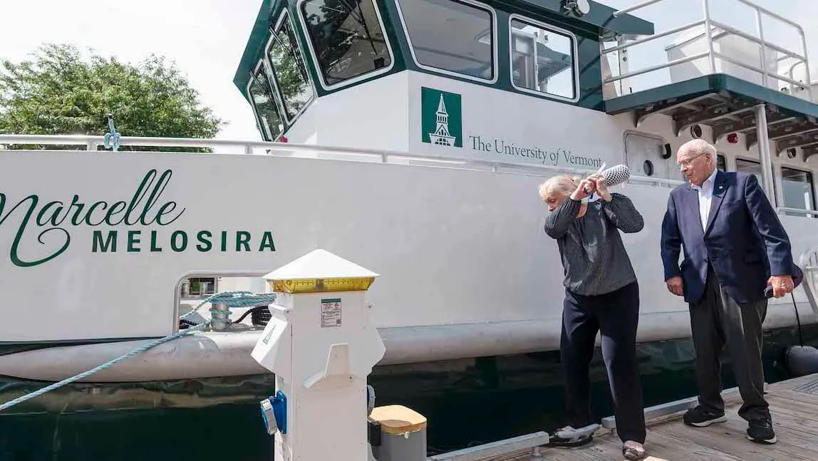 Marcelle Leahy and former U.S. Senator Patrick Leahy, prepare to christen UVM's new research vessel, the Marcelle Melosira.