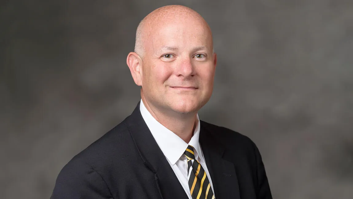 Headshot of Trenten Klingerman, UVM's new vice president for legal affairs and general counsel.