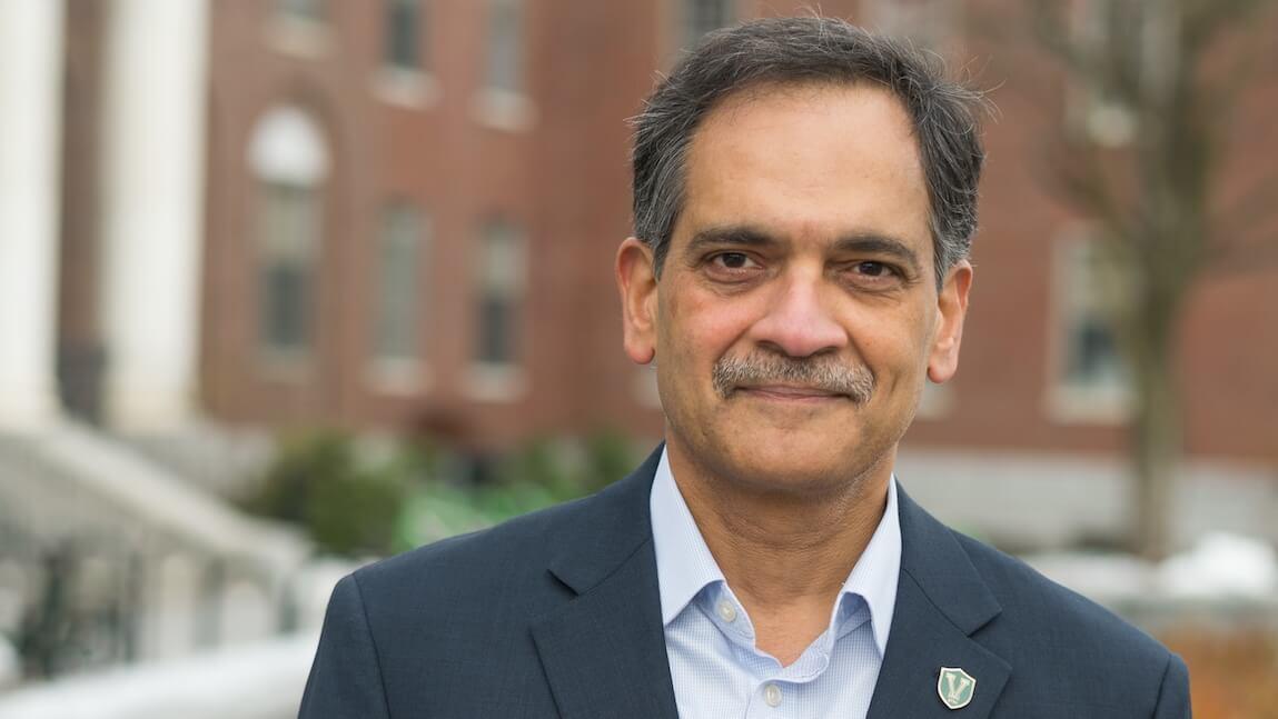 Suresh Garimella standing in front of the Waterman Building