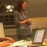 a image of a person standing and smiling 