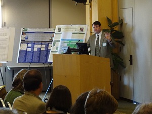 Picture of Commissioner Patrick Berry speaking at the VMC Conference
