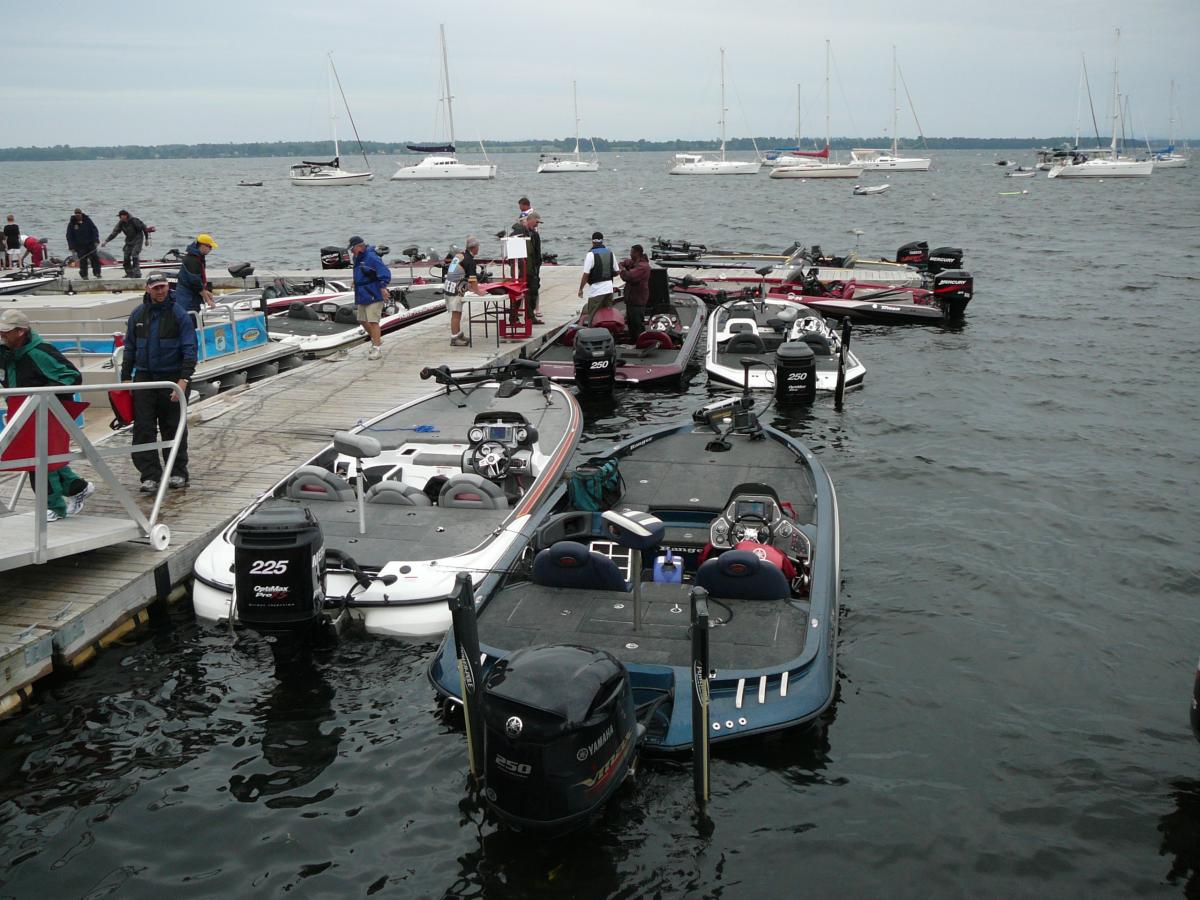 People and boats at a marina