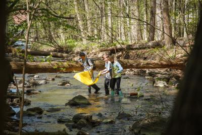 Students participating in a stream monitoring class at Potash Brook