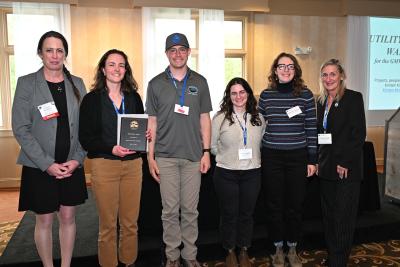 The BLUE team accepting the GMWEA award