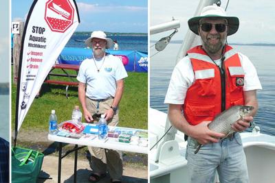 Mark Malchoff at aquatic invasives educational table, holding a whitefish and tagging a bass