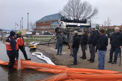 Participants along lake at oil spill prevention workshop