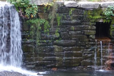 Pelletier Dam with water flowing over and through prior to its removal.