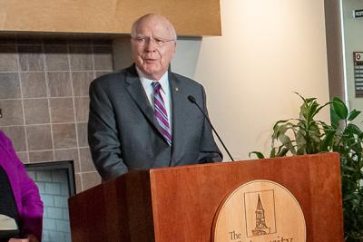 Patrick and Marcelle Leahy at podium of University of Vermont press conference