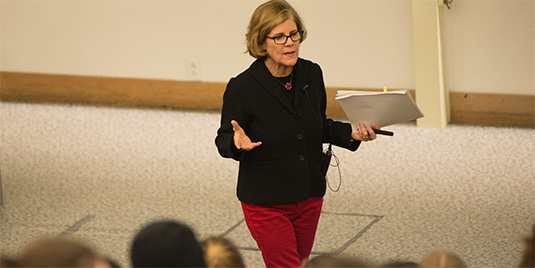 Professor lectures to her class