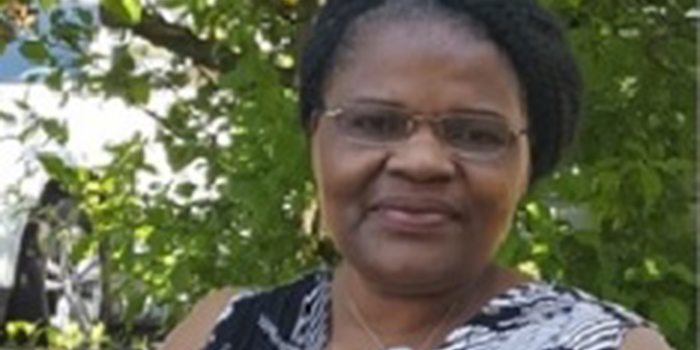 Cecile smiling outside
