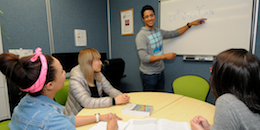 Tutor at a white board