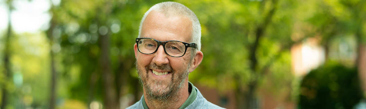 headshot of Mark Usher in an outdoor setting