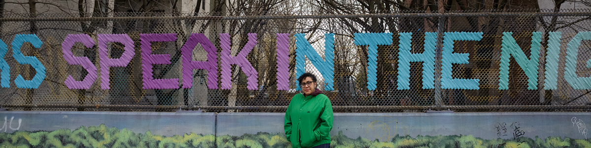 Mildred Belter in front of one of her art projects in Brooklyn, NY