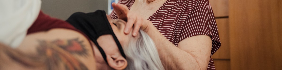 Integrative health practitioner with patient