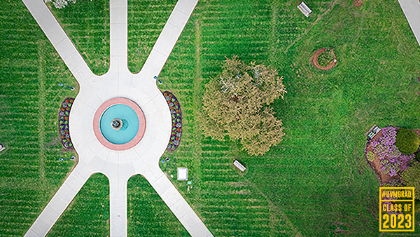 the uvm green and waterfountain from a drone