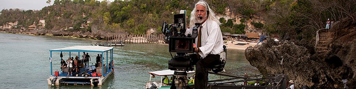 Robert Richardson at an elevated camera rig on a movie set