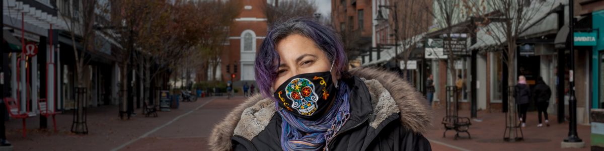 Tina Escaja wearing a mask on Church Street in Burlington, VT