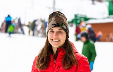 Portrait of woman in winter clothing slopeside