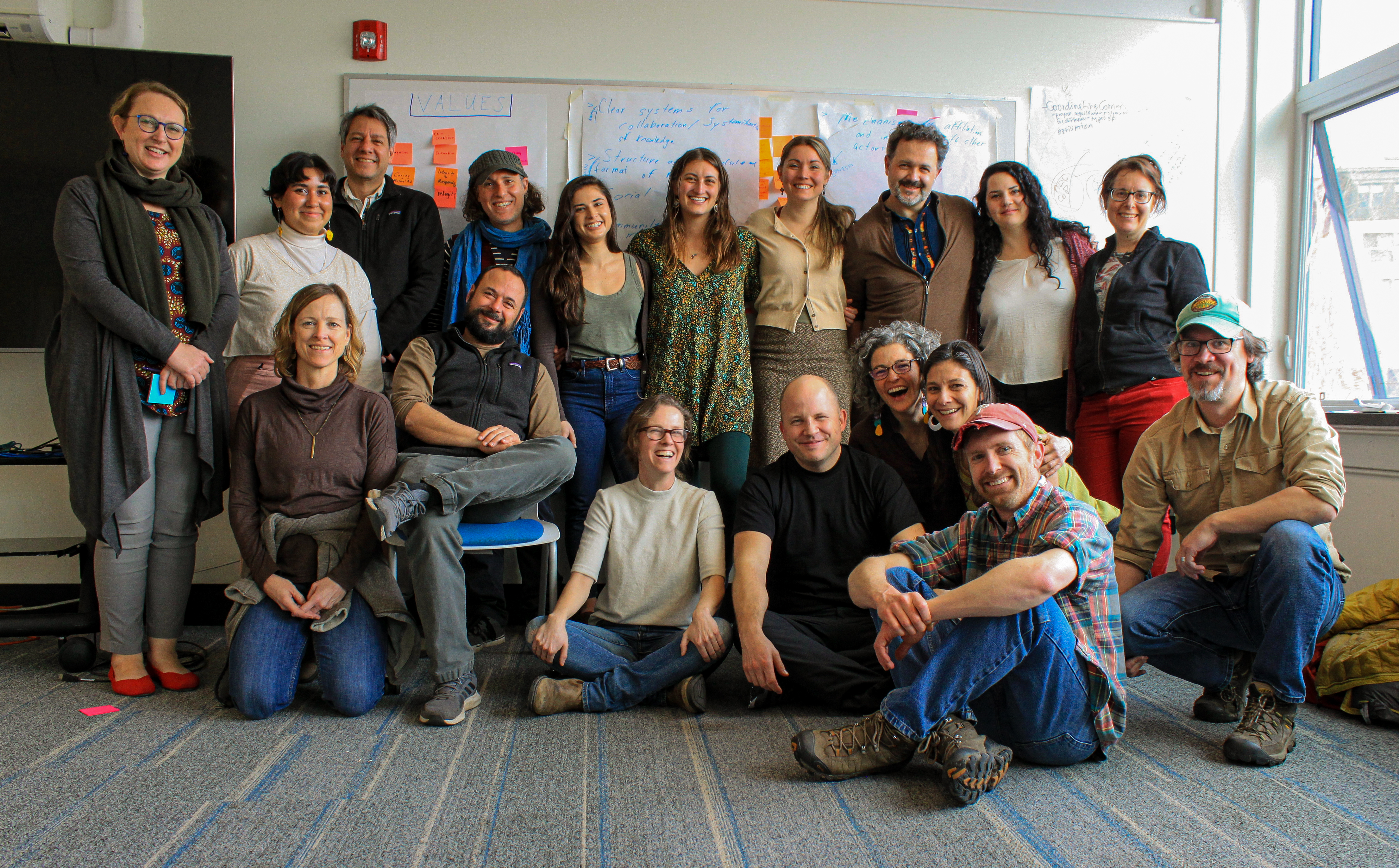 A group of colleagues posing for a photo