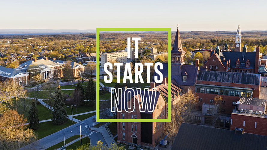 aeriel view of uvm camous at sunrise with "It Starts Now" over-layed on top