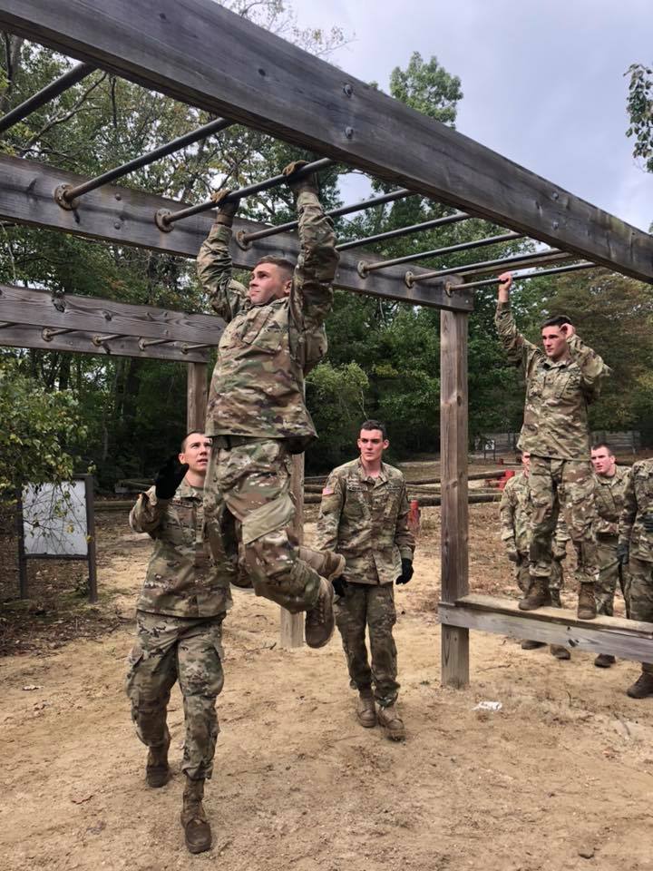 Cadets climb across monkey bars at the annual Ranger Challenge event.