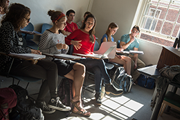 teacher engaging with students during class