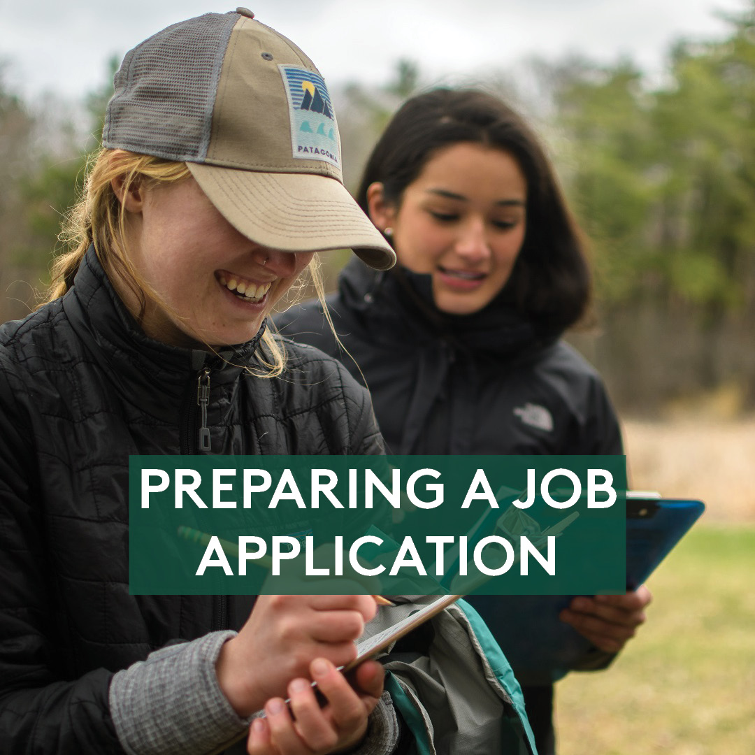 Students taking notes outside on a clipboard, text reads "Preparing a job application"