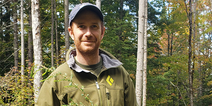 Peter Clark with forest background