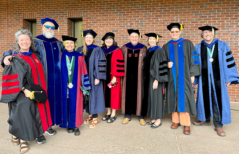 Faculty of the new school of world literatures together in full regalia after commencement '23