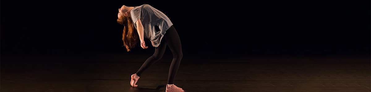 A student performs a modern dance.