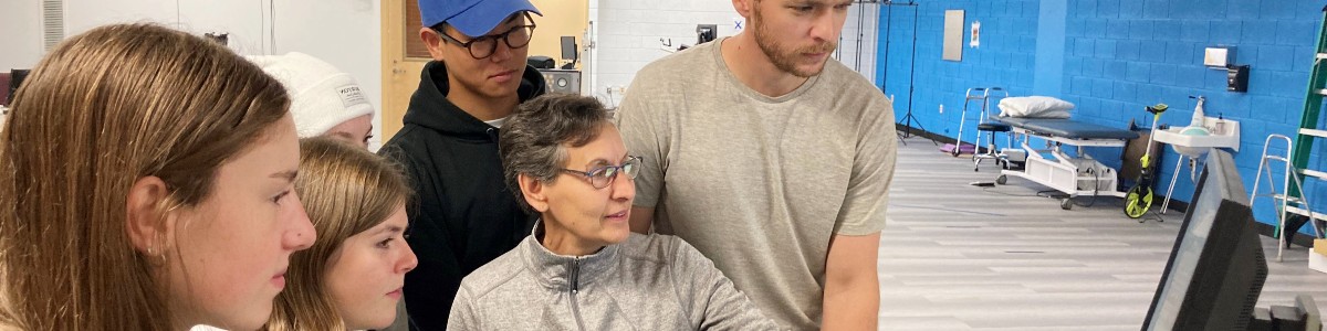 Dr. Sue Kasser with students in Human Motion Analysis Lab