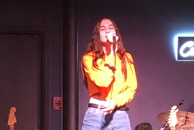 Pearl Stuart singing on stage