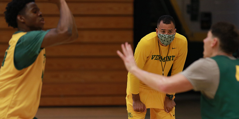 Hamlet Tibbs coaching a basketball practice.