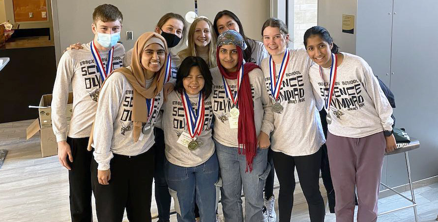 students wearing science olympiad shirts