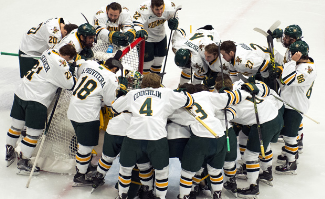 UVM hocky huddling in Belfast
