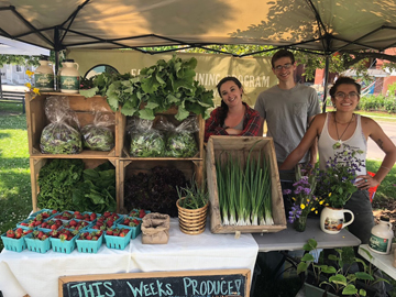 Selling UVM Catamount Farm Produce at a Local Farmers' Market