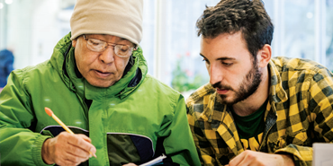 student participating in service learning course