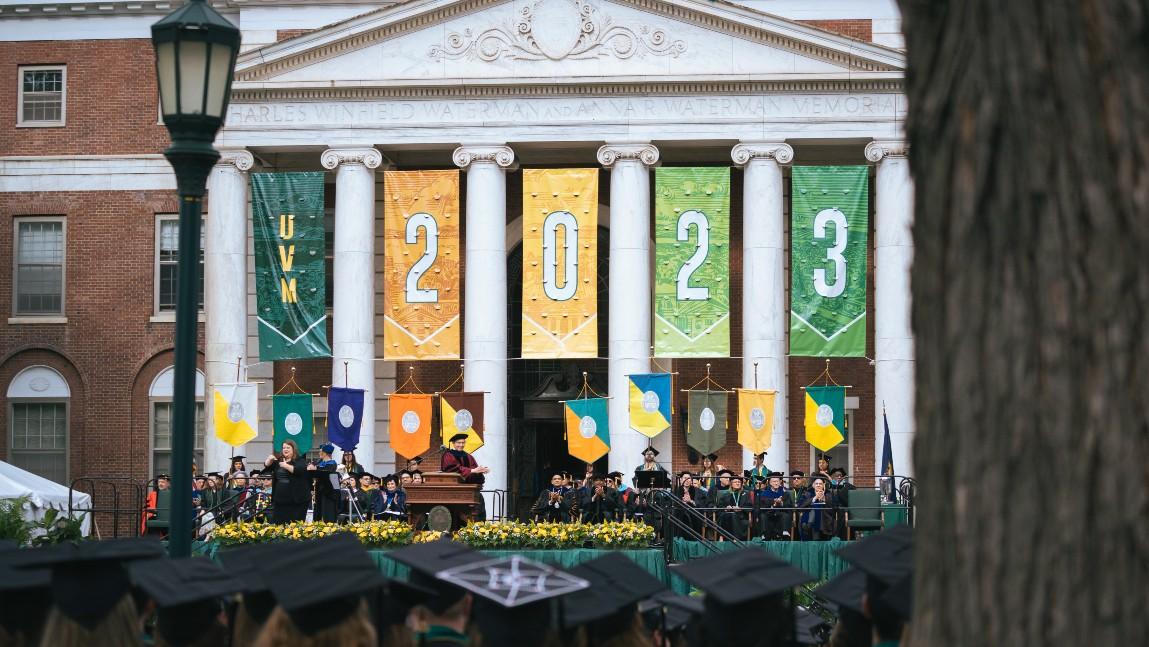 UVM Waterman Building with Class of 2023 Banner hanging from columns