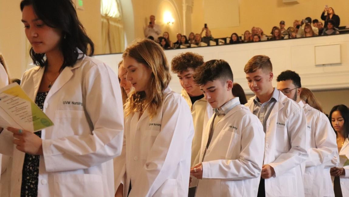 Second-year and direct-entry nursing students received white coats as they prep for clinical experiences.