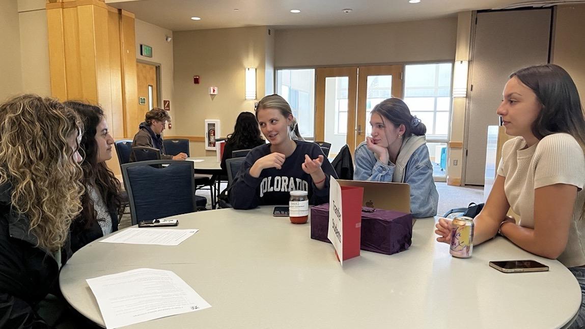 Senior CDAE students Amrita Shore, Payton Kurrle, and Avery Wisehart meeting with First Year to learn about strategies to make the most of their time at UVM.