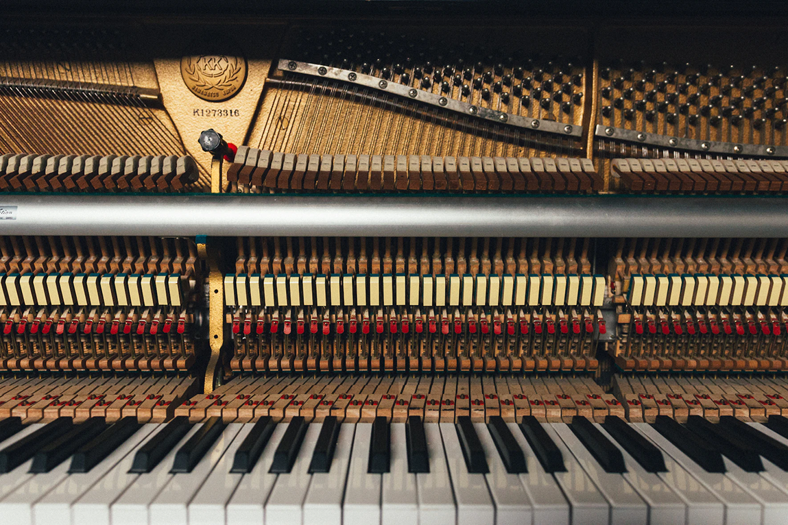 Inner workings of a baby grand piano